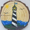 Black And White Striped Lighthouse On Coast Wood Ornament